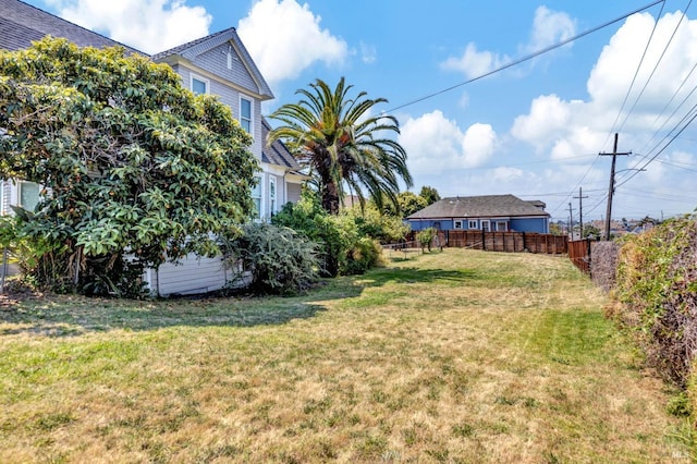 view of yard with fence