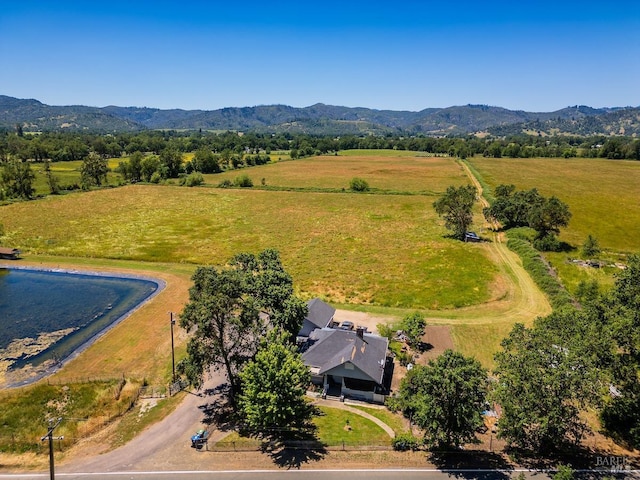 bird's eye view featuring a mountain view and a rural view