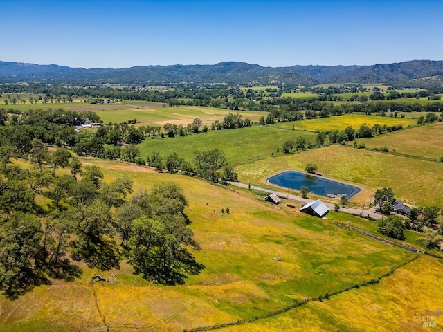 aerial view featuring a mountain view and a rural view