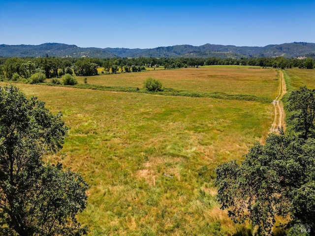 property view of mountains with a rural view