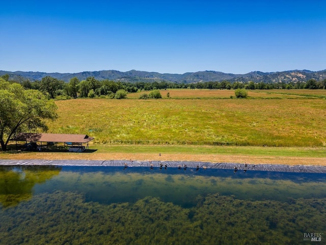 property view of mountains with a rural view