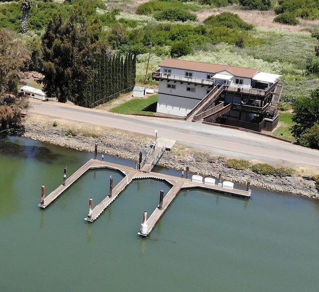 drone / aerial view with a water view
