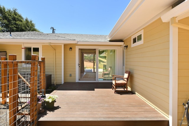 doorway to property with a wooden deck