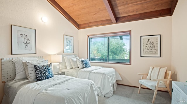 carpeted bedroom with wooden ceiling and vaulted ceiling