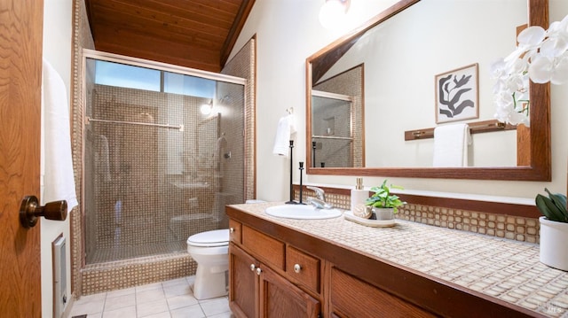 bathroom with vanity, wooden ceiling, tile patterned flooring, toilet, and a shower with shower door