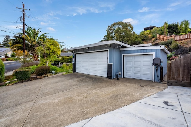 garage featuring fence