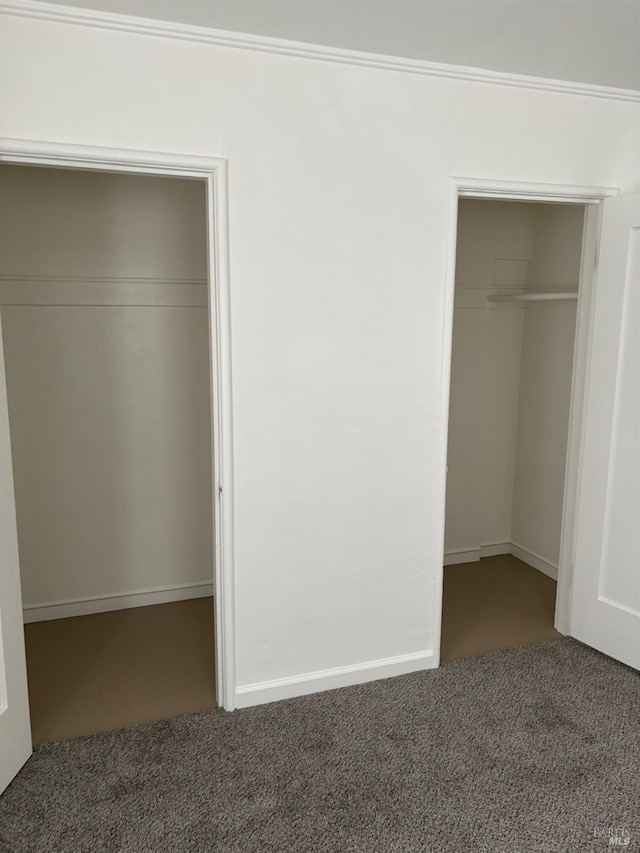 unfurnished bedroom featuring carpet flooring