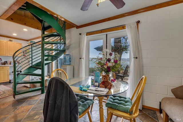 dining room with stone tile floors, a ceiling fan, stairs, crown molding, and recessed lighting