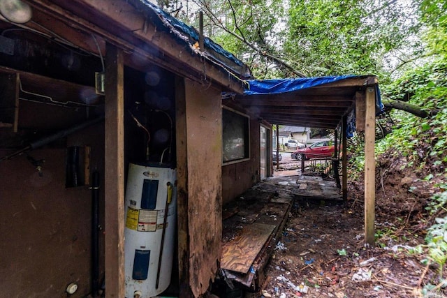 view of side of property with electric water heater