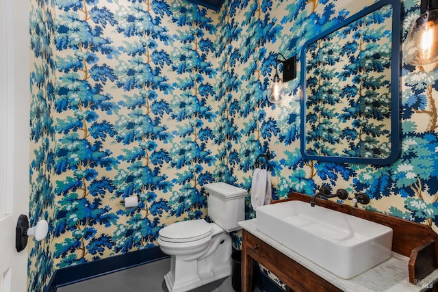 bathroom with vanity and toilet