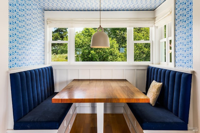 dining area with hardwood / wood-style flooring