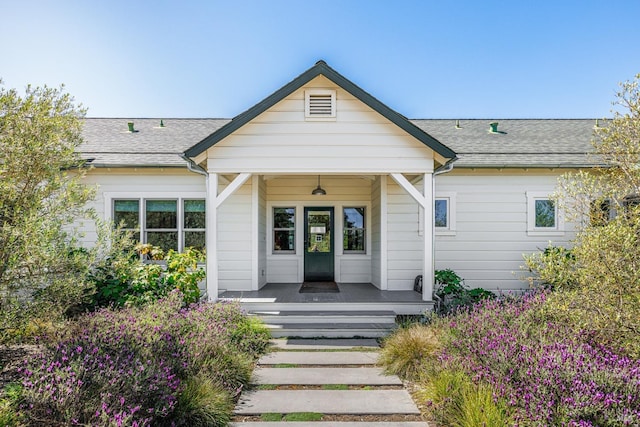 ranch-style house with covered porch