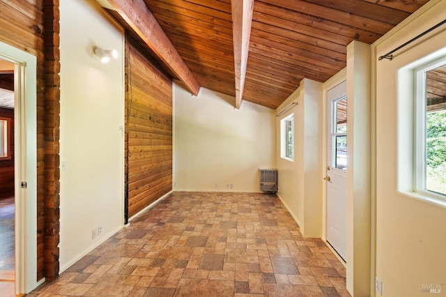 bonus room with lofted ceiling with beams and wooden ceiling