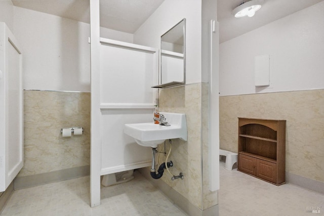 bathroom featuring tile flooring