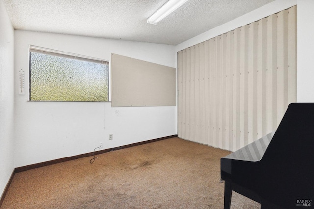 living area with vaulted ceiling, carpet, and a textured ceiling