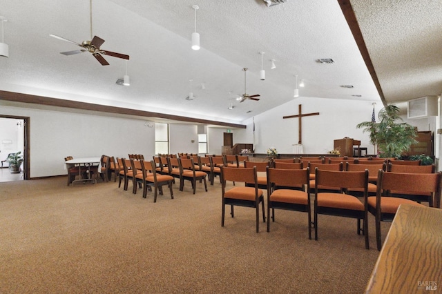 dining area featuring carpet, ceiling fan, and lofted ceiling