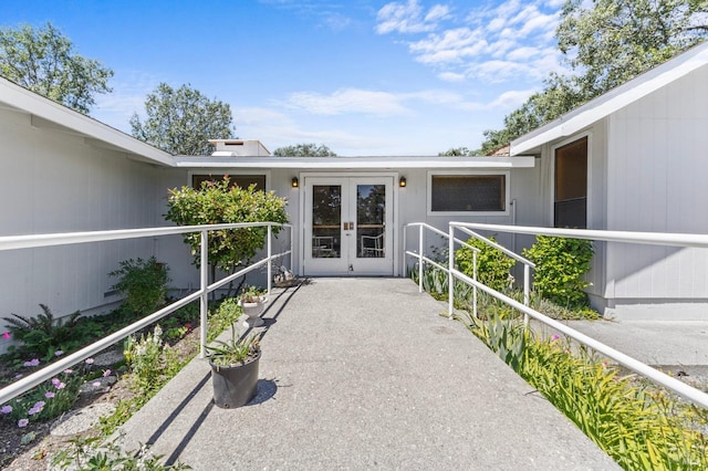 property entrance featuring french doors