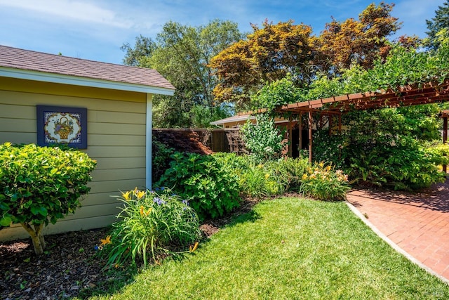 view of yard with a pergola