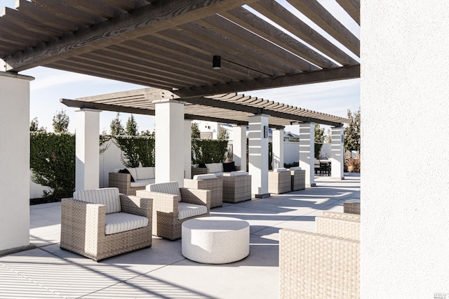 view of patio / terrace with a pergola and an outdoor hangout area