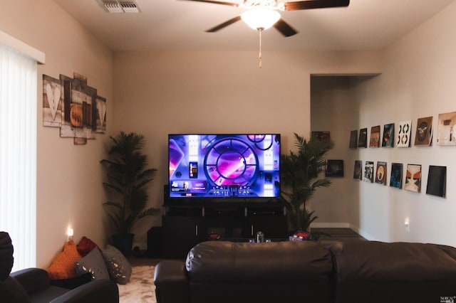 interior space featuring ceiling fan