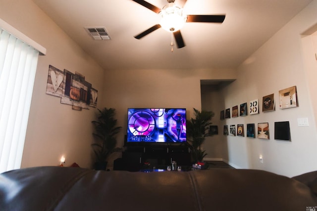 living room featuring ceiling fan