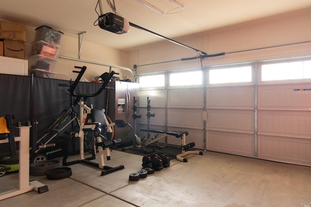 exercise room featuring concrete flooring