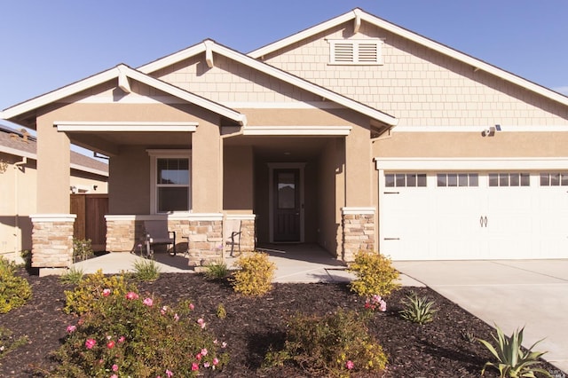 craftsman house with a garage