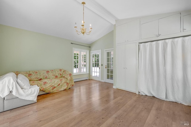 sitting room with lofted ceiling with beams, a notable chandelier, baseboard heating, and light hardwood / wood-style flooring