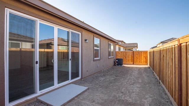 view of side of property with a patio