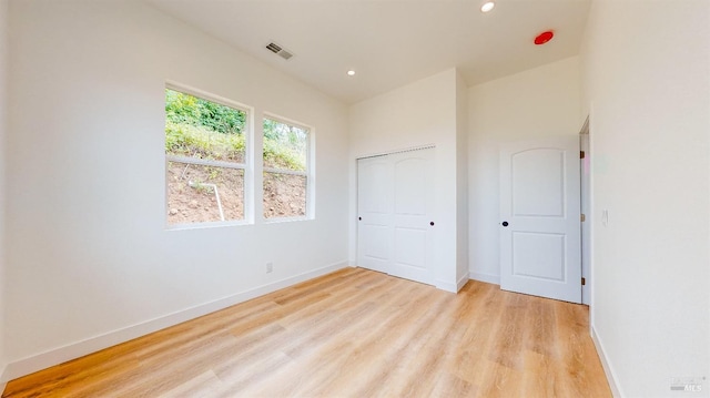 unfurnished bedroom featuring light hardwood / wood-style flooring