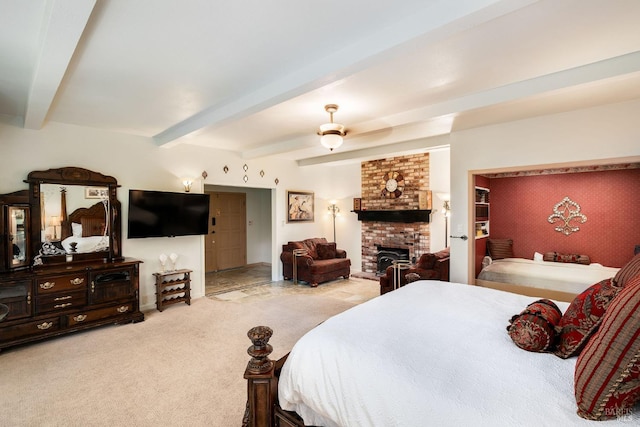 carpeted bedroom featuring beamed ceiling and ceiling fan