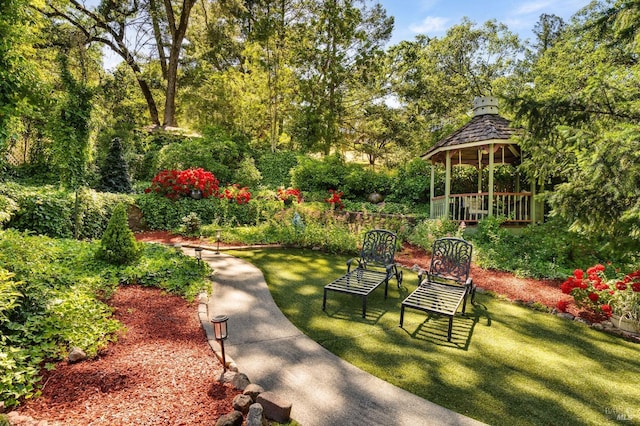 view of home's community featuring a gazebo and a yard