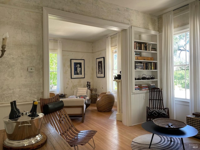 751 Crystal Springs Rd, Saint Helena, CA 94574 - living room featuring built in features, a healthy amount of sunlight, and light wood-type flooring