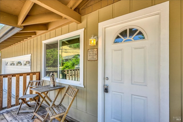 entrance to property with covered porch