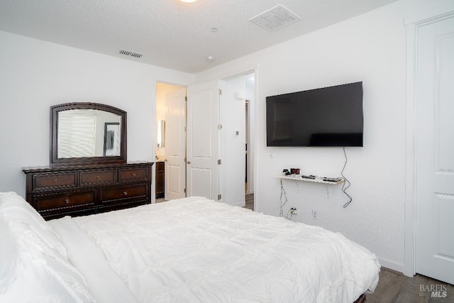 bedroom with a textured ceiling