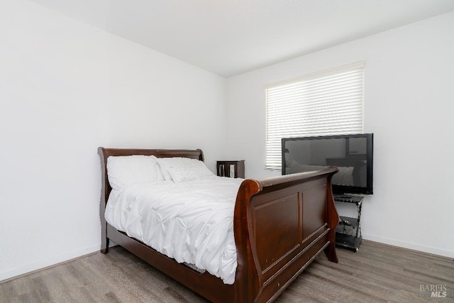 bedroom featuring hardwood / wood-style floors