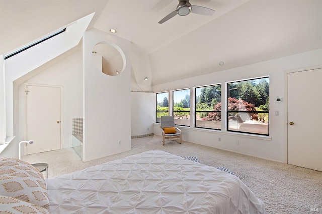 bedroom featuring light carpet, ceiling fan, and lofted ceiling