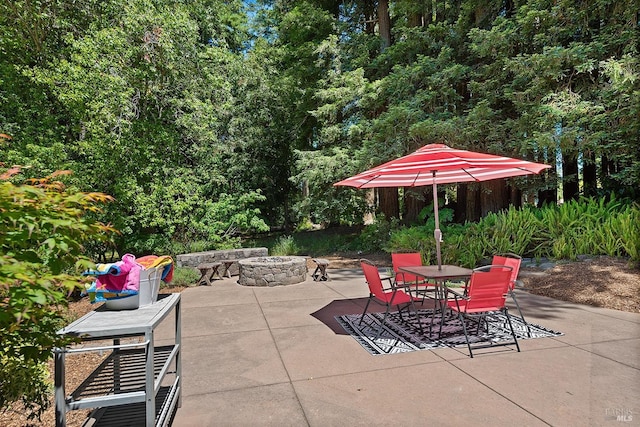 view of patio / terrace featuring a fire pit