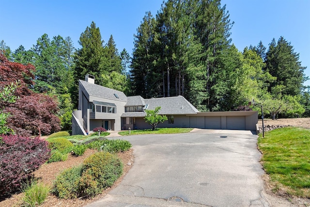 12430 Fiori Ln, Sebastopol, CA 95472 - view of front facade featuring a chimney and a detached garage