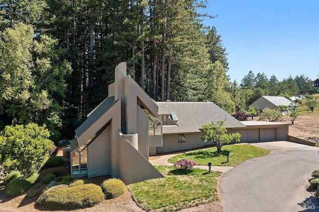 view of home's exterior featuring a lawn