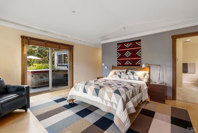 bedroom featuring light wood-type flooring, access to outside, vaulted ceiling, and ornamental molding