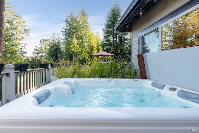 exterior space with a jacuzzi