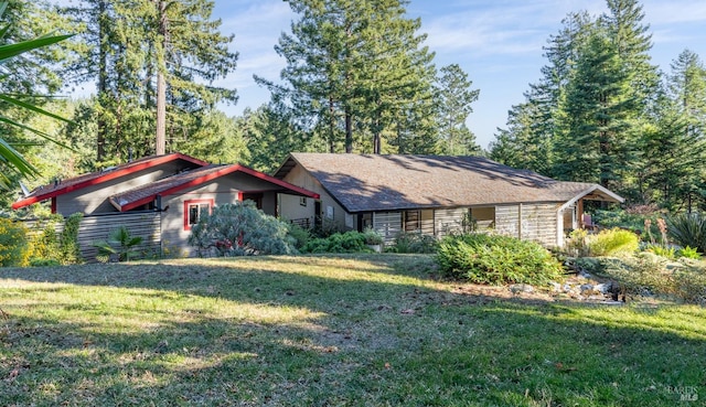 21995 Ansel Ct, Timber Cove, CA 95450 - view of front of property with a front lawn