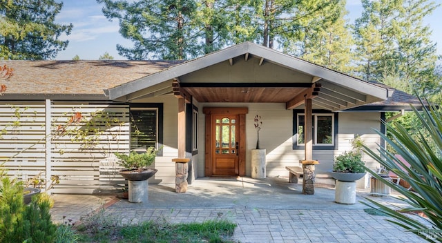 21995 Ansel Ct, Timber Cove, CA 95450 - view of exterior entry featuring roof with shingles