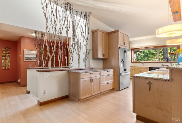 21995 Ansel Ct, Timber Cove, CA 95450 - kitchen featuring high end refrigerator, light brown cabinetry, a sink, and light wood-style flooring