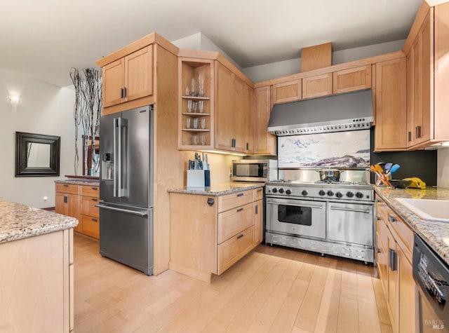21995 Ansel Ct, Timber Cove, CA 95450 - kitchen with high quality appliances, wall chimney exhaust hood, light brown cabinets, light wood-style flooring, and open shelves