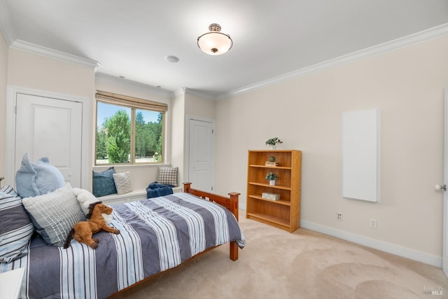 bedroom featuring light carpet, ornamental molding, and baseboards