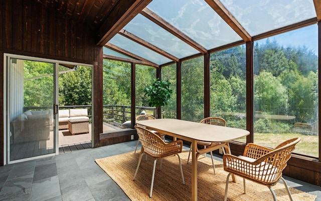 sunroom with lofted ceiling