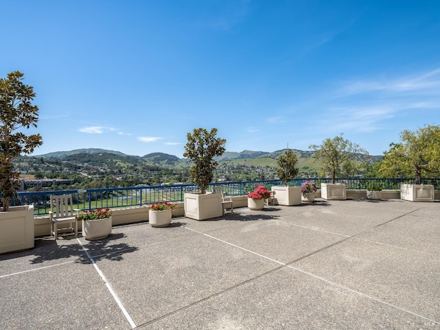 view of patio / terrace with a mountain view