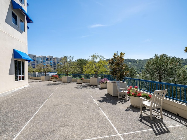 view of patio / terrace with a mountain view